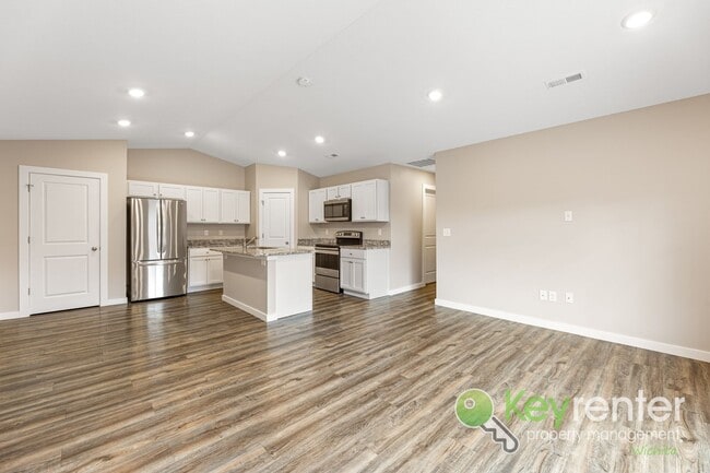 Building Photo - E 69th Ct N Duplex