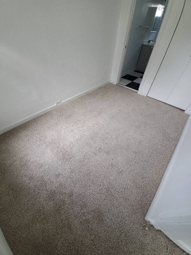 Building Photo - Newly Renovated 4BR/1BA Single-Family Home with Garage – Cleveland