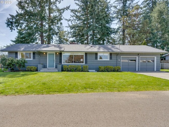 Building Photo - Stylishly Updated Mid-Century Gem on a Qui...