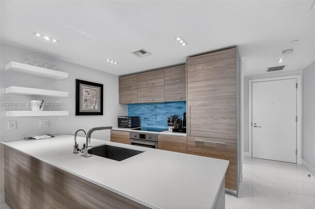 Building Photo - 1300 S Miami Ave