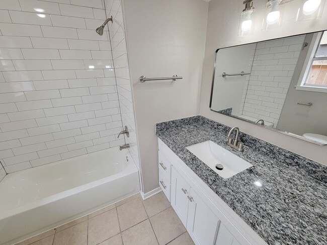 Building Photo - Welcome to your dream rental! This meticulously remodeled 3-bedroom, 2-bathroom home in the heart...