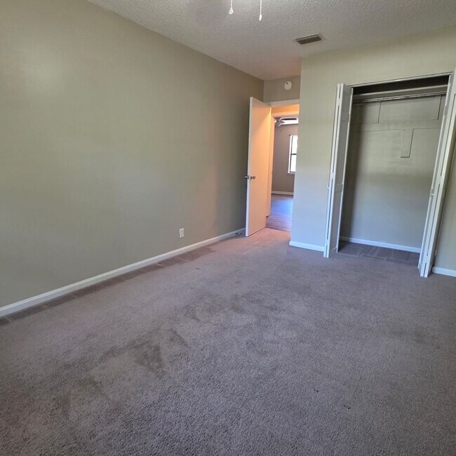 Building Photo - Corner Lot Charm: Spacious 4 Bed on Corner Lot w/ Custom Bookshelves & Private Storage Shed