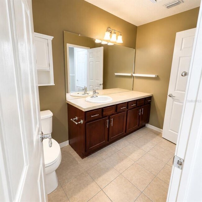 Building Photo - 10222 Pink Palmata Ct