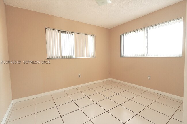 Building Photo - 9915 W Okeechobee Rd