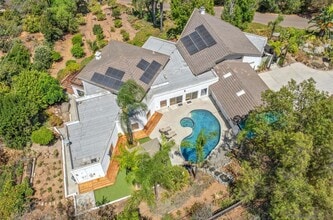 Building Photo - Spacious 4-Bedroom Home with Pool, Panoramic Views, and Solar on 1.5 Acres