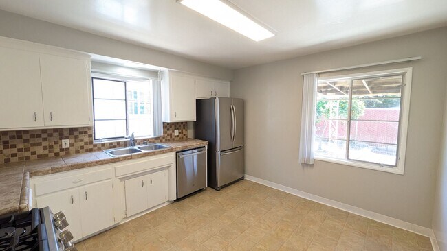 Building Photo - Available in July - New flooring and paint