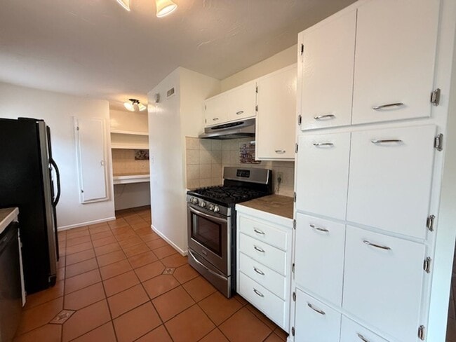 Building Photo - College View Estates Gem – Spacious 3BR Home with Private Yard & RV Parking