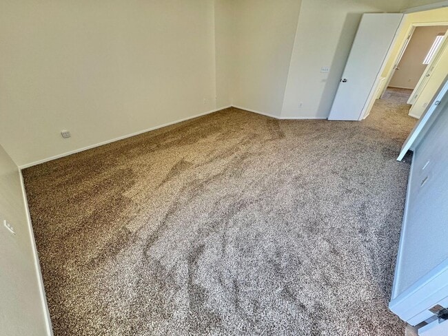 Building Photo - WELCOME TO THIS SPACIOUS 4-BEDROOM, 2.5-BA...