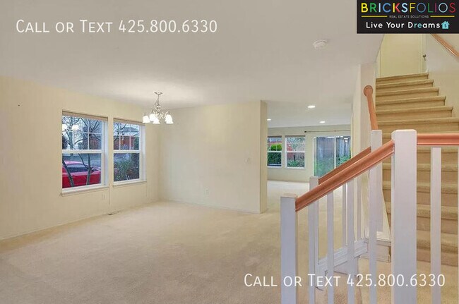 Building Photo - Dream Kitchen, Dual Fireplaces: Find Your Stylish Sanctuary in Redmond Ridge.