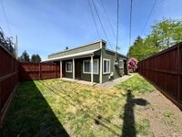 Building Photo - Charming 2 Bedroom Duplex - Granite Counters, Plank Flooring, Fully Fenced, Storage Shed!