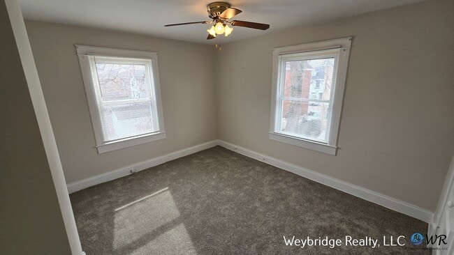 Building Photo - Charming 3BR Home in Norwood with Fenced Yard, Detached Garage & Workshop – Prime Location!