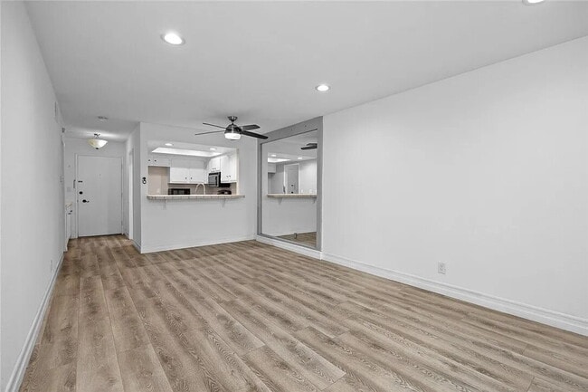Building Photo - "Charming 1-Bedroom Furnished Retreat with...