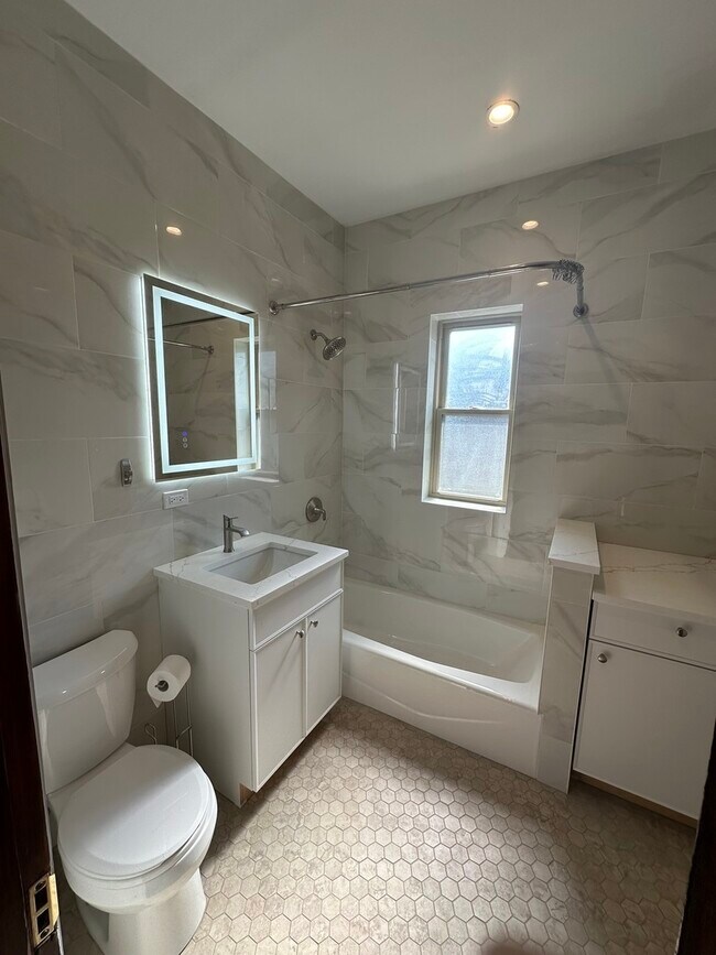 Building Photo - 5648 W Higgins Ave