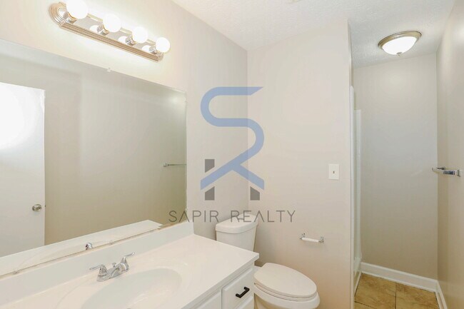 Building Photo - A Peaceful Woodland Retreat – 3BR/2BA Home in Jonesboro