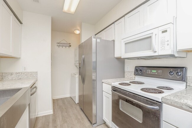 Building Photo - Cathedral Ceilings & Coastal Vibes—This 2B...