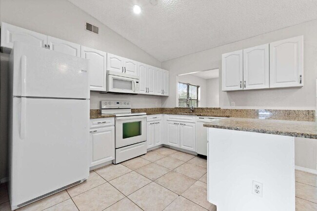 Building Photo - Comfort, Space & Convenience on a Peaceful Corner Lot in the Shores