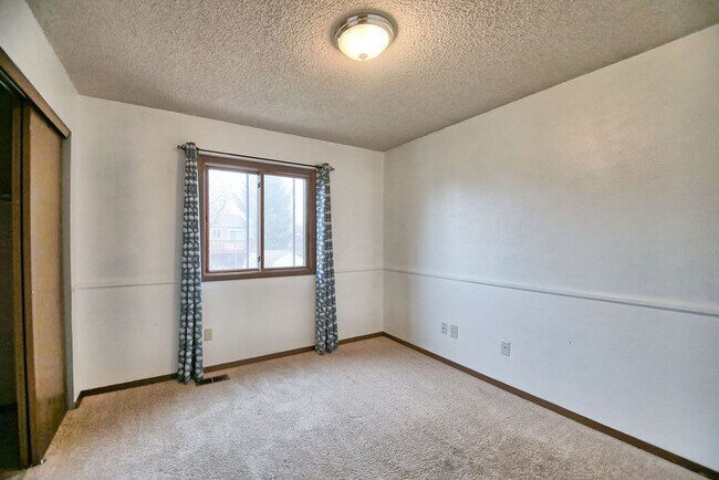 Building Photo - 4-Bedroom Home Near CSU | Fenced Yard & 2-Car Garage