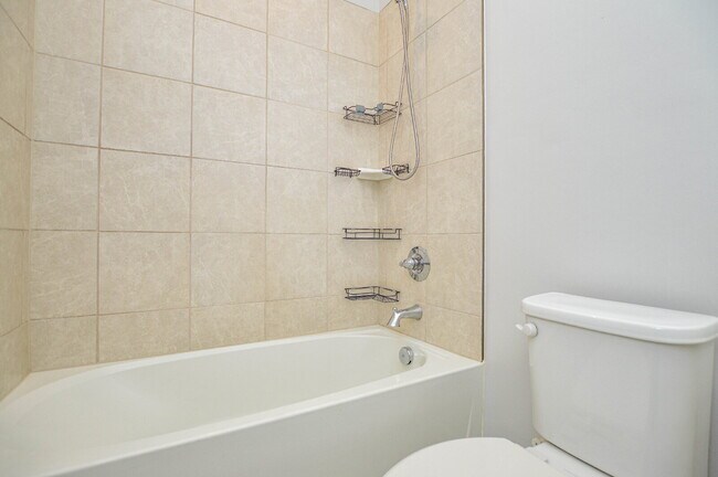 Building Photo - 3 Bedrooms | 2.5 Bathrooms | Lower-Level Flex Room | Approximately 1,978 Square Feet | 2-Car Gara...