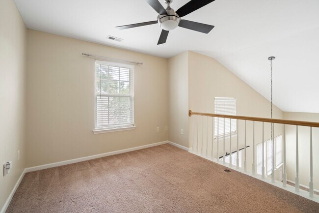 Building Photo - Located in Highland Creek