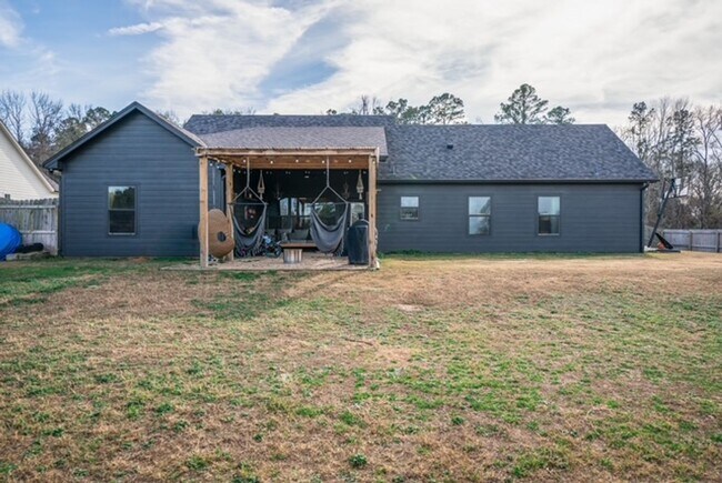 Building Photo - STUNNING modern farmhouse built in 2022 on 1 acre just outside the city limits of Tyler!