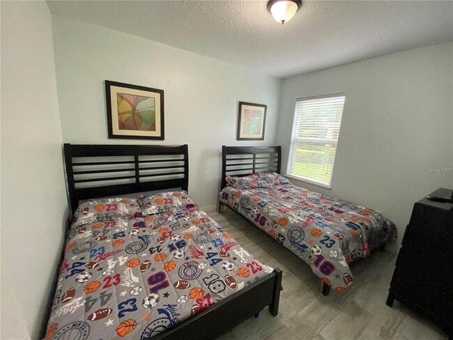 Building Photo - 9027 Paolos Pl