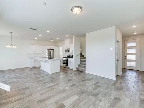 Building Photo - NEW! Modern, Wilson Home. 3 bedrooms / 2.5-bathroom single-family home in a quiet gated community...