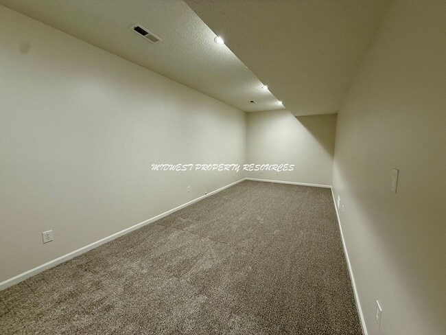 Building Photo - Spacious 3 Bedroom Home with Finished Basement, Covered Deck & Fenced Yard
