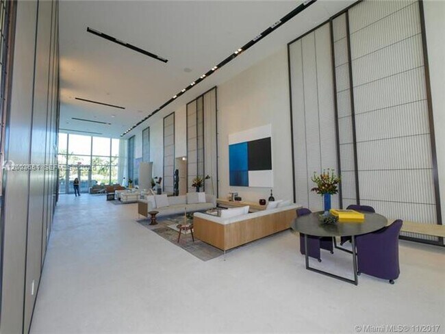 Building Photo - 10201 Collins Ave