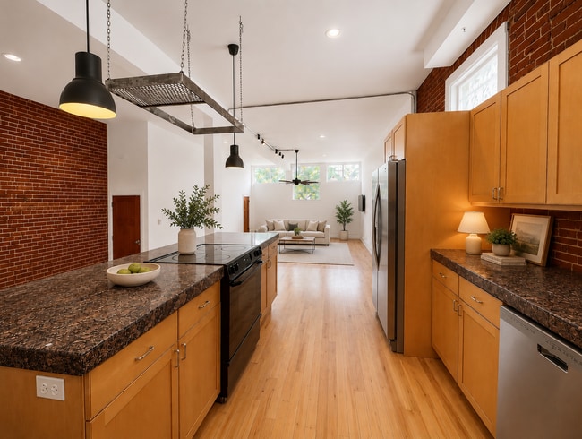 Building Photo - Located in the Historic Baker District, this uniquely converted warehouse features updates throug...
