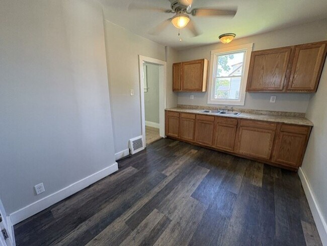 Building Photo - Comfortable Akron Home with Covered Front Porch, Dining Room & 2-Car Garage