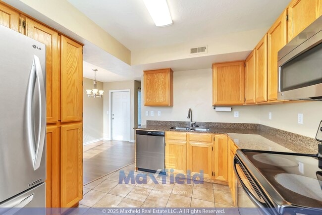 Building Photo - $1000 Off! Stoney Brook Condos Unit #2 - 2BD - 2BTH 1GAR