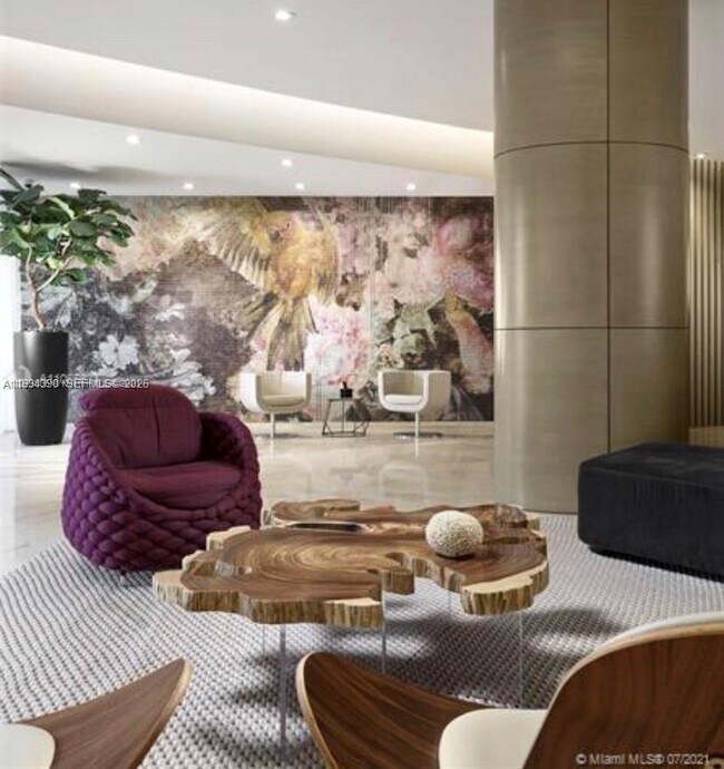 Building Photo - 10275 Collins Ave