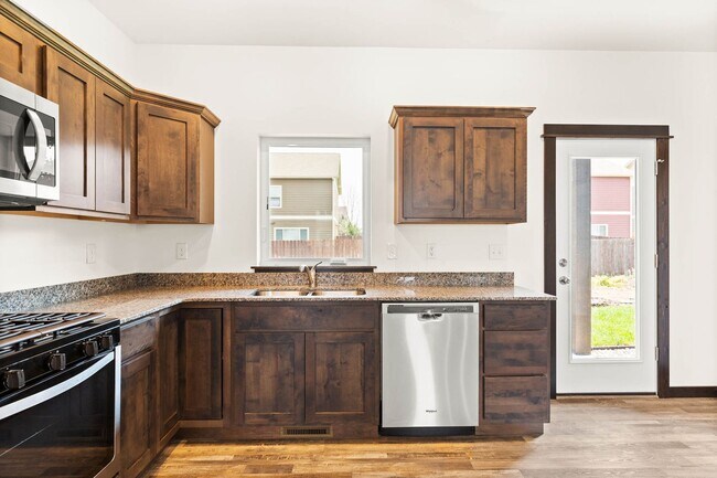 Building Photo - 2-Story Urban Triplex at a modern community featuring 3 Bedrooms 2.5 Bathrooms