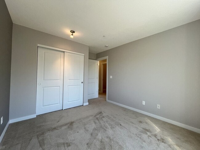 Building Photo - Modern 4-Bedroom Home on Large Corner Lot ...