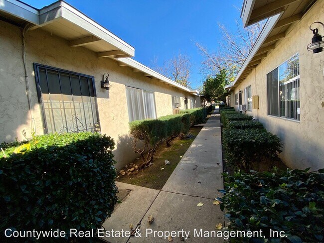 Building Photo - 1100-1154 N Mollison Ave