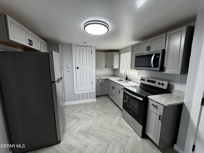 Building Photo - 10277 N Loop Dr
