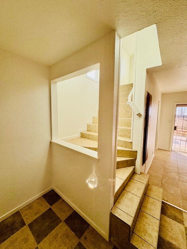 Building Photo - Country-style home with 3 bedrooms, Upstairs Den/Office, 2 baths offering a charming and peaceful...