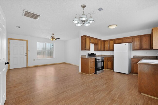 Building Photo - Rural South Valley 4 Bedroom  1.75 Bath 1256/sf