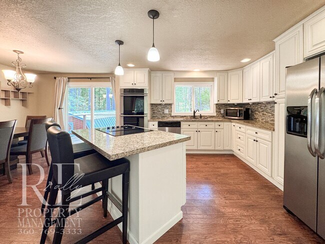 Building Photo - Bright & Spacious Split-Level Home with Gourmet Kitchen, Skylight & Expansive Yard