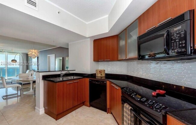 Building Photo - 16699 Collins Ave