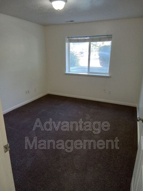 Building Photo - 8083 N Ridge Loop E