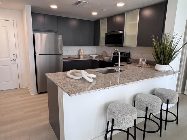 Building Photo - 5587 Millennia Park Dr