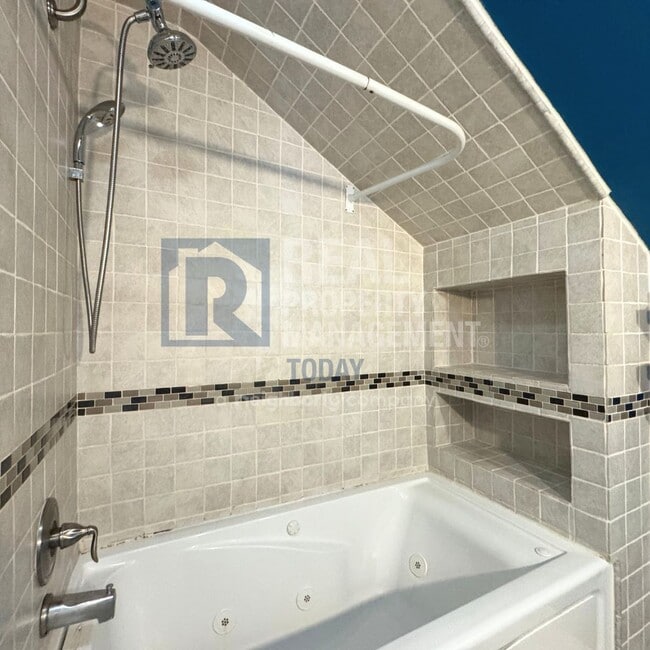 Building Photo - Sweet 3 bedroom and 2 bath + 3 car garage ...