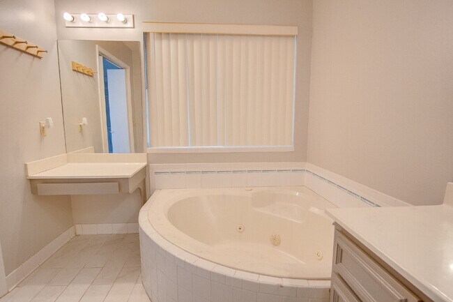 Building Photo - Pool Home with Office, Two Primary Suites ...