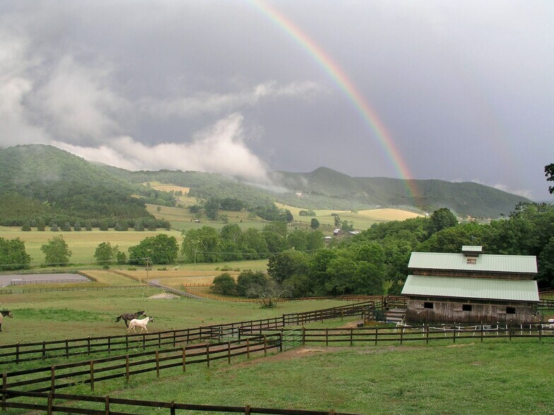 Ranbow over the pastures and barn. The valley gets amazing rainbows frequently during summer months. - 2353 Lusters Gate Rd