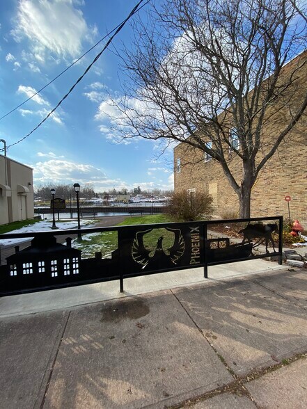 Lock 1 Community Park next to building - 67 State St