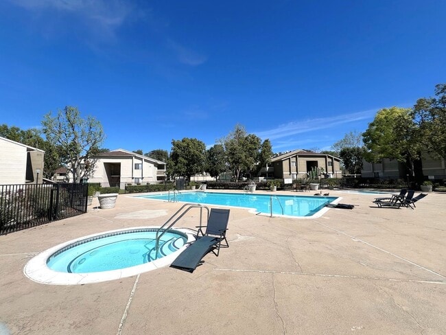 Building Photo - Ground Level 2 Bedroom Condo with Private Patio in Gated Community for Lease