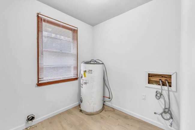 Building Photo - Cozy 3BR Home with Spacious Yard & XL Carport!