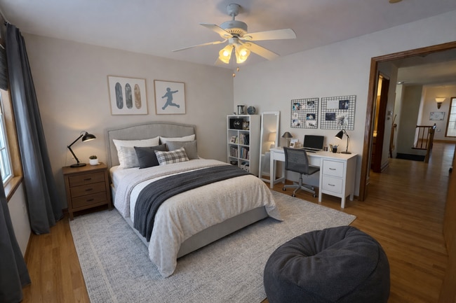 Building Photo - Spacious 3BR/3BA Condo with Finished Basement + 2-Car Garage — Available Now