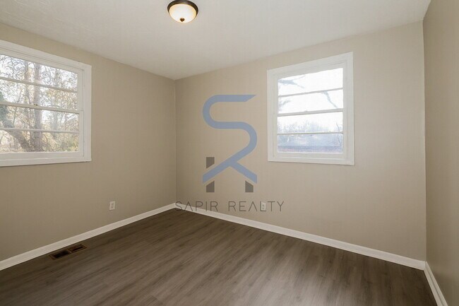 Building Photo - Move in before December 15th and choose your reward: a $250 Amazon Gift Card or a 55" Smart TV!